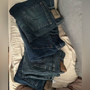 Men’s dark blue jeans. Bootcut relaxed fit. Levi, wrangler and old navy.